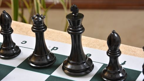Dark colored chess pieces