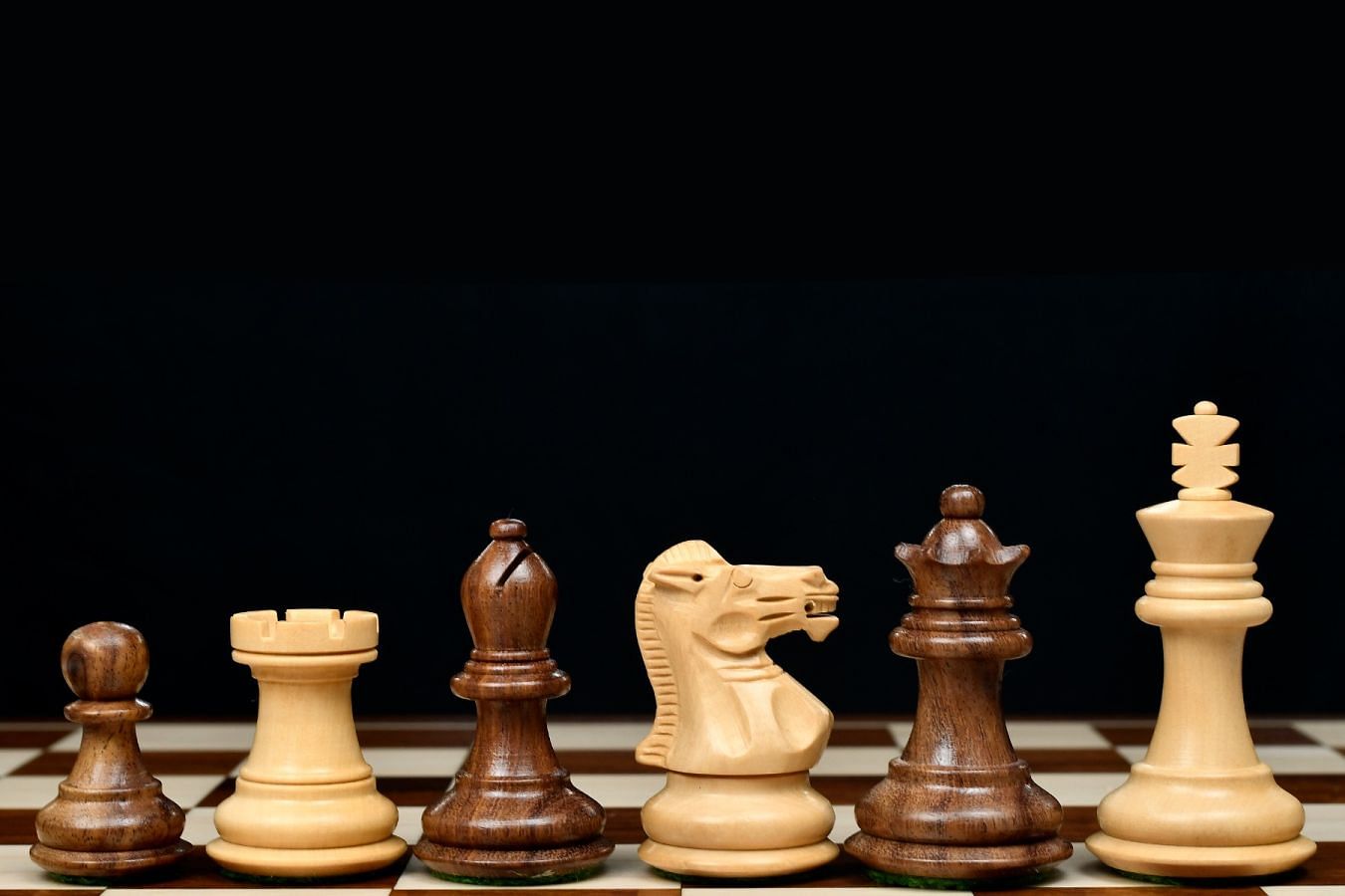 Get Collector Series Wooden Staunton Chess Pieces - 2.6